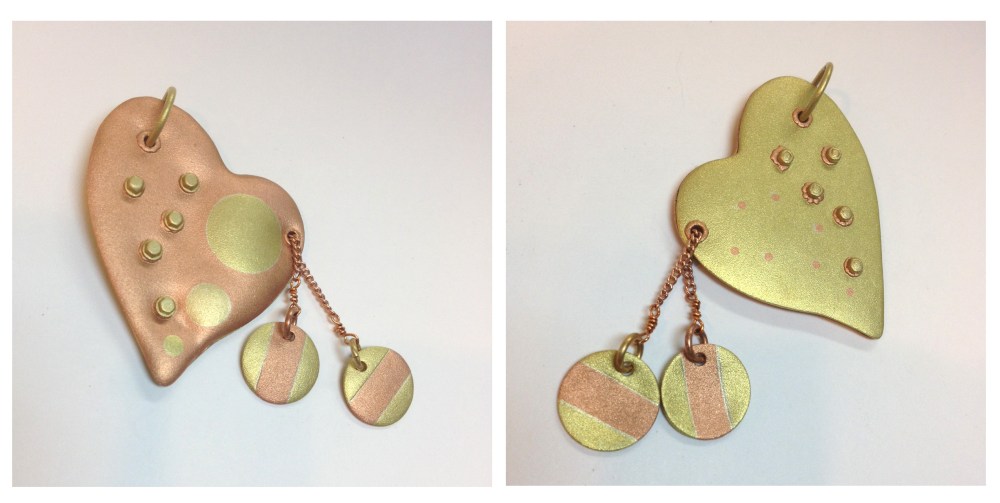 This sandblasted heart pendant was made by Anne Evanson. She incorporated stripe inlay and polka dot inlay techniques in her project. 