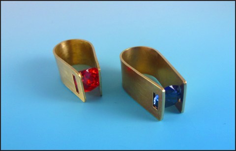 These tension set rings are also made by student, Michele Murphy. She fabricated them out of cubic zirconia and nugold. 