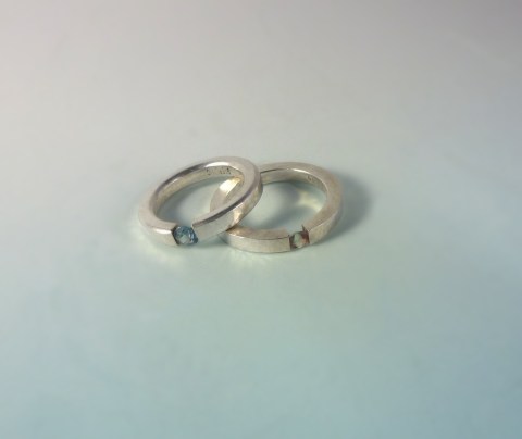 These tension set rings are made of sterling silver, cubic zirconia and tourmaline. These samples I made are classic examples of tension setting.
