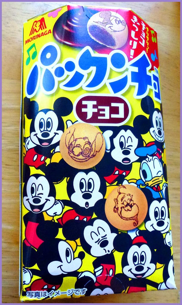 Pakuncho: Cookie biscuits filled with creamy chocolate.  Disney characters are imprinted on each cookie.