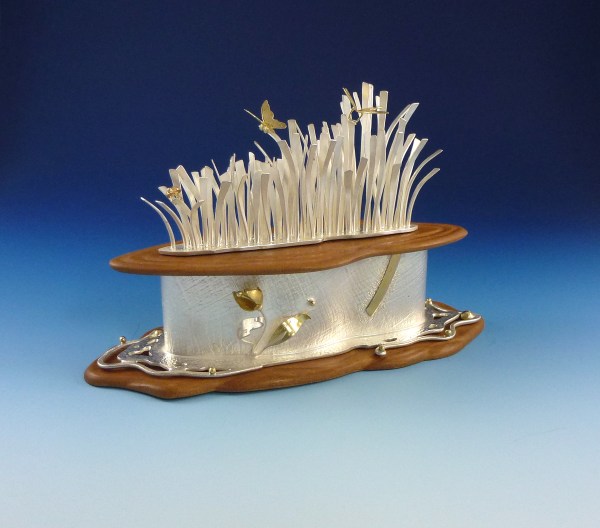 Sacred Earth Container: This box is fabricated out of sterling silver, 18kt gold, and cherry wood. Sand is stored within the box. Earth is a sacred element in Shinto practice and is used for spiritual cleansing.