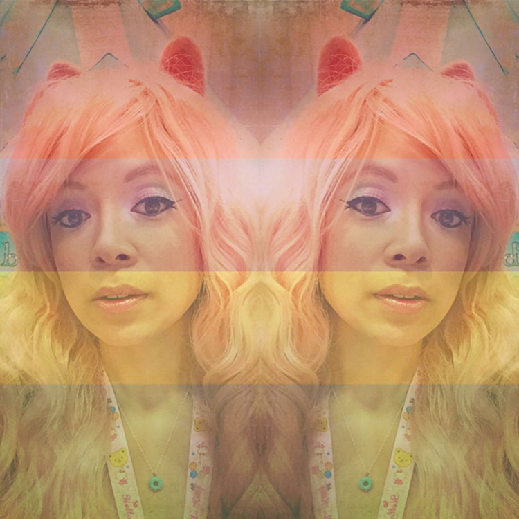 I made my felted pink cat ear headband. I'm wearing another Gothic Lolita wig in a pastel peach color. 