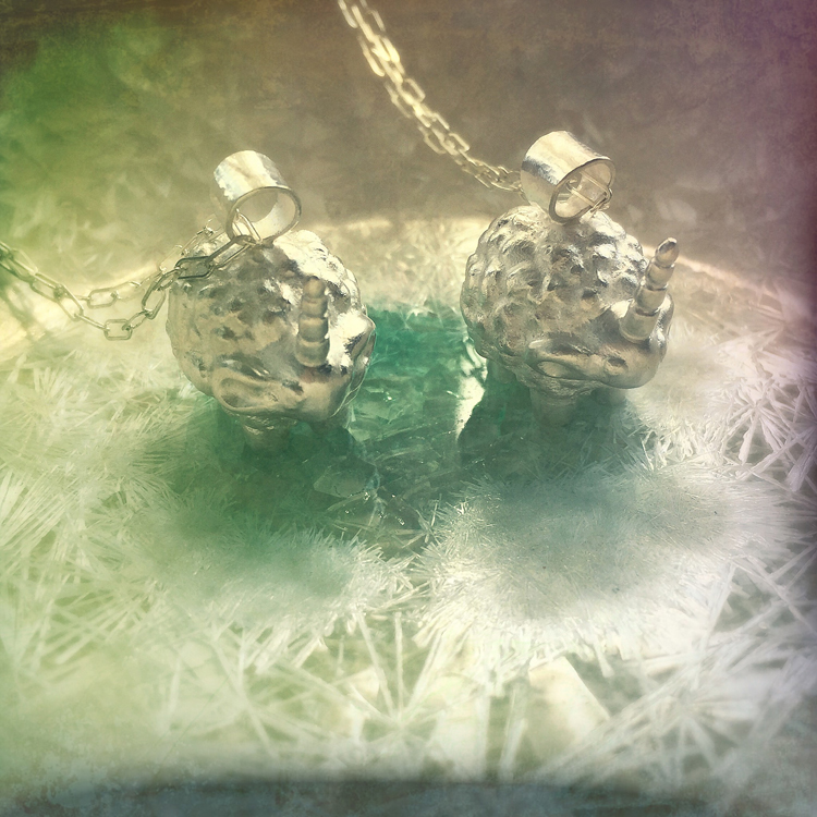 My silver sheepicorn or unisheep necklaces.